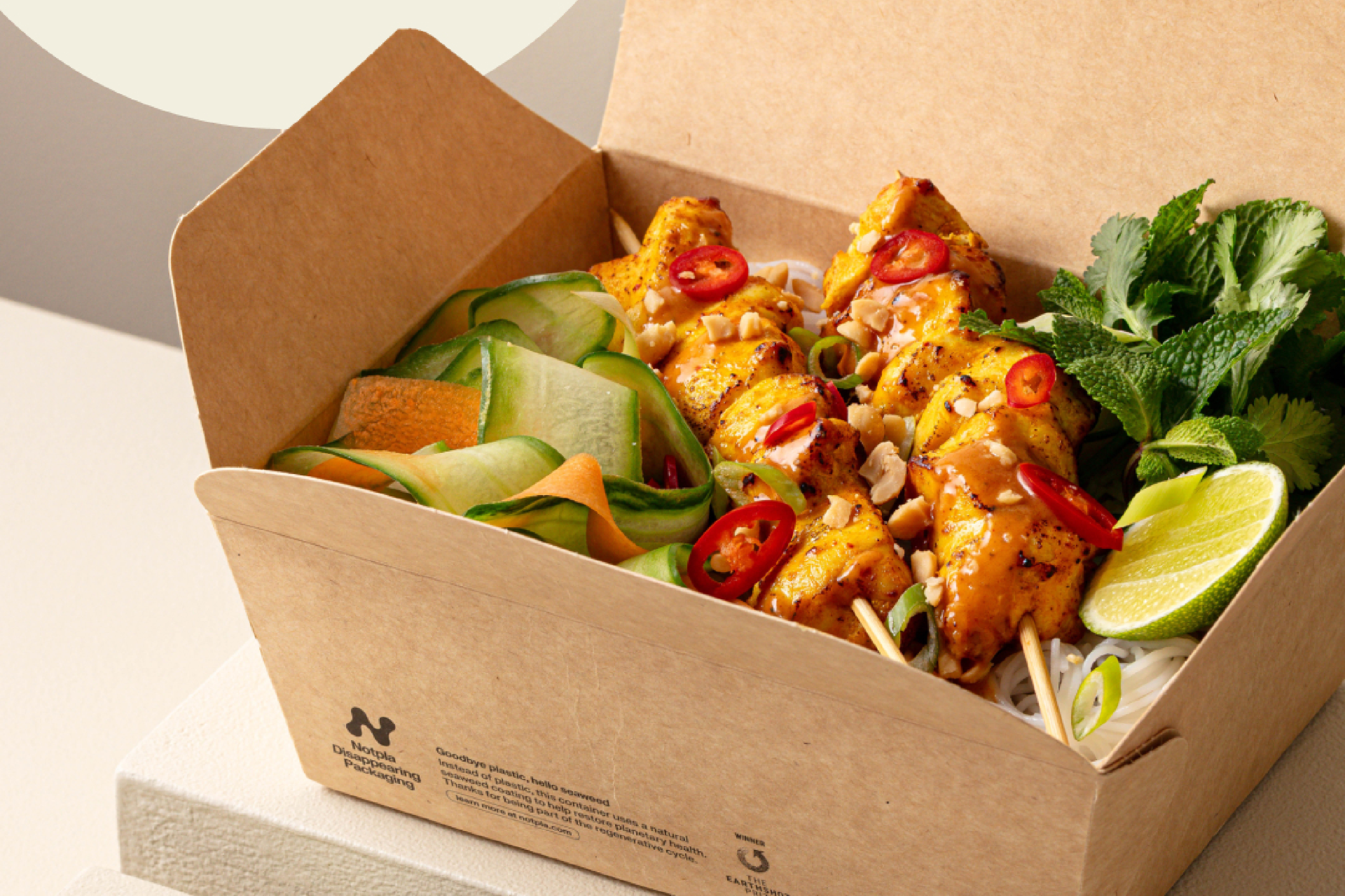 Food in a Notpla cardboard package