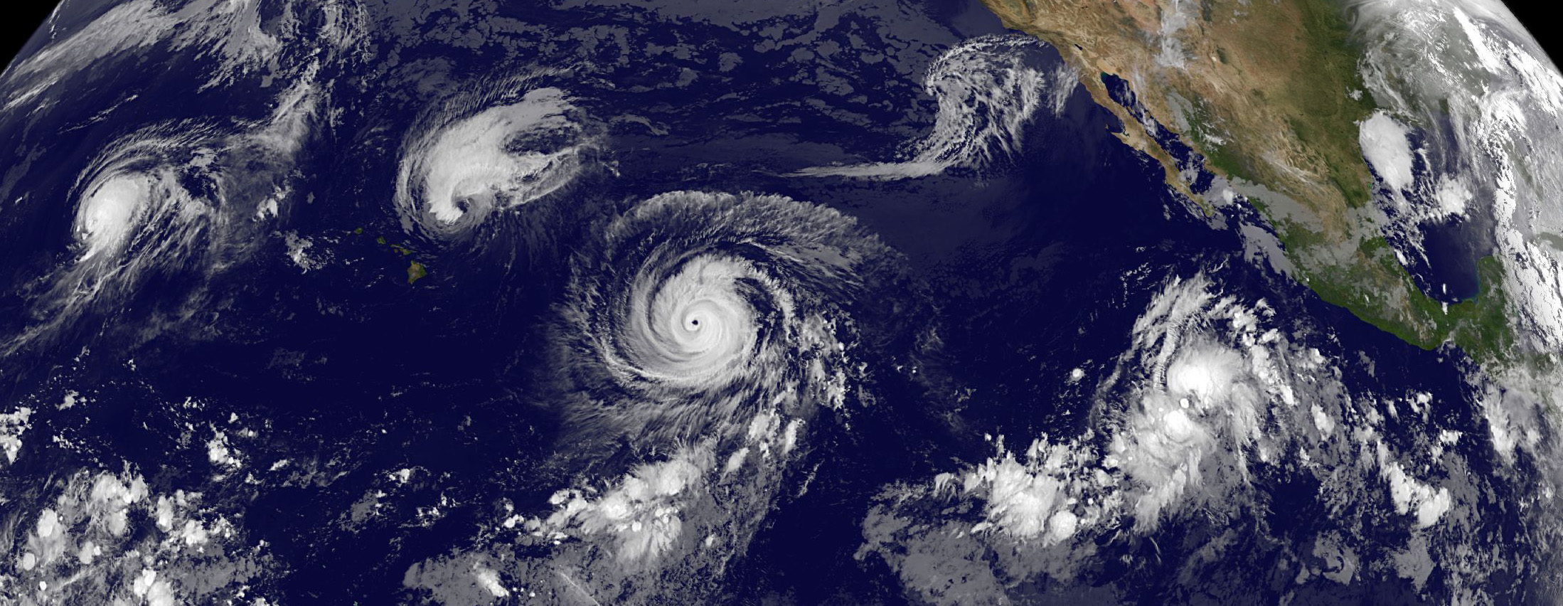 Satellite image of four tropical cyclones