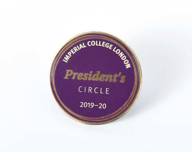 A purple President's Circle badge 