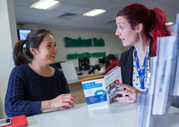 Student receiving advice in the Student Hub