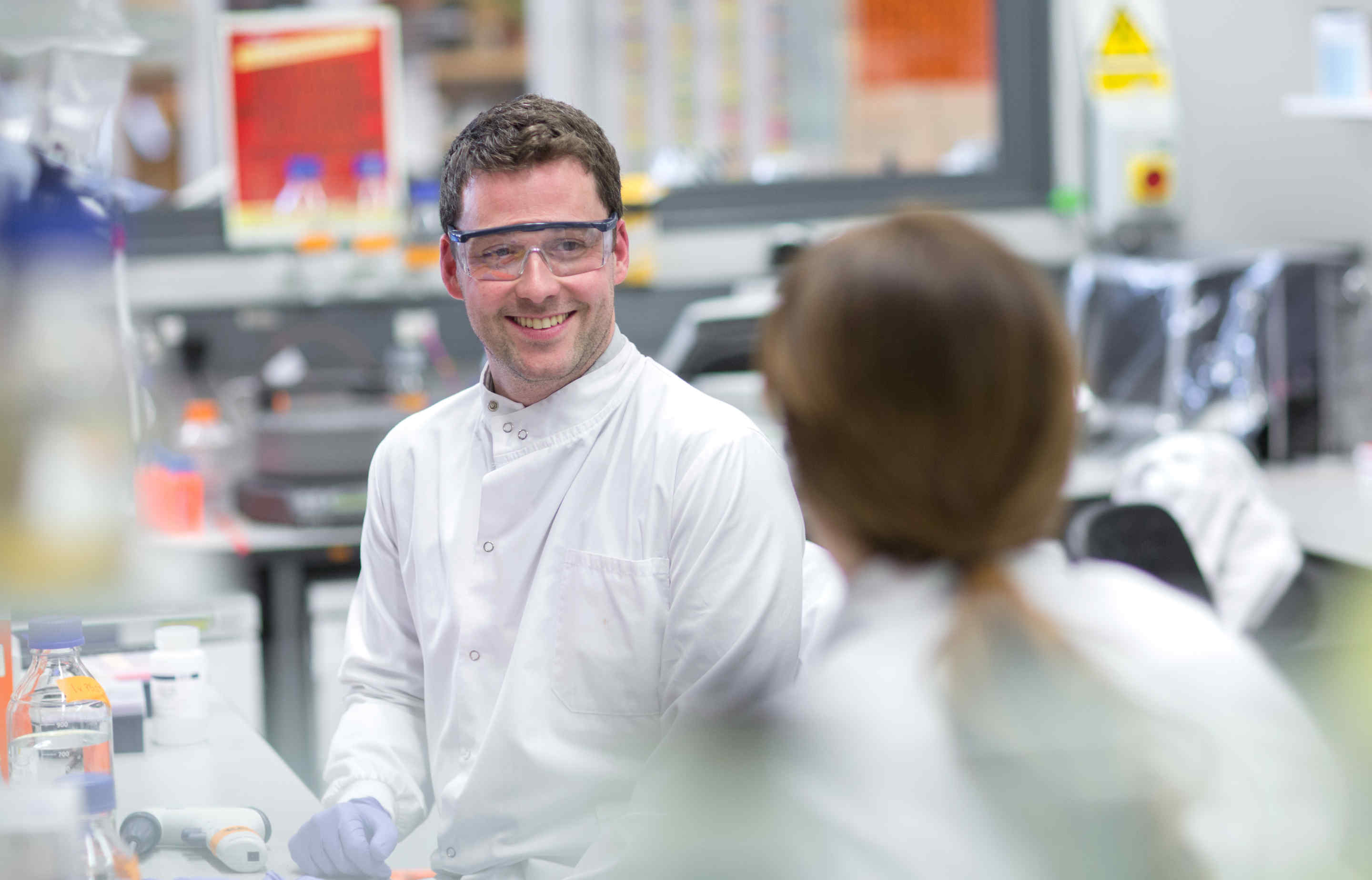 Researchers in malaria lab