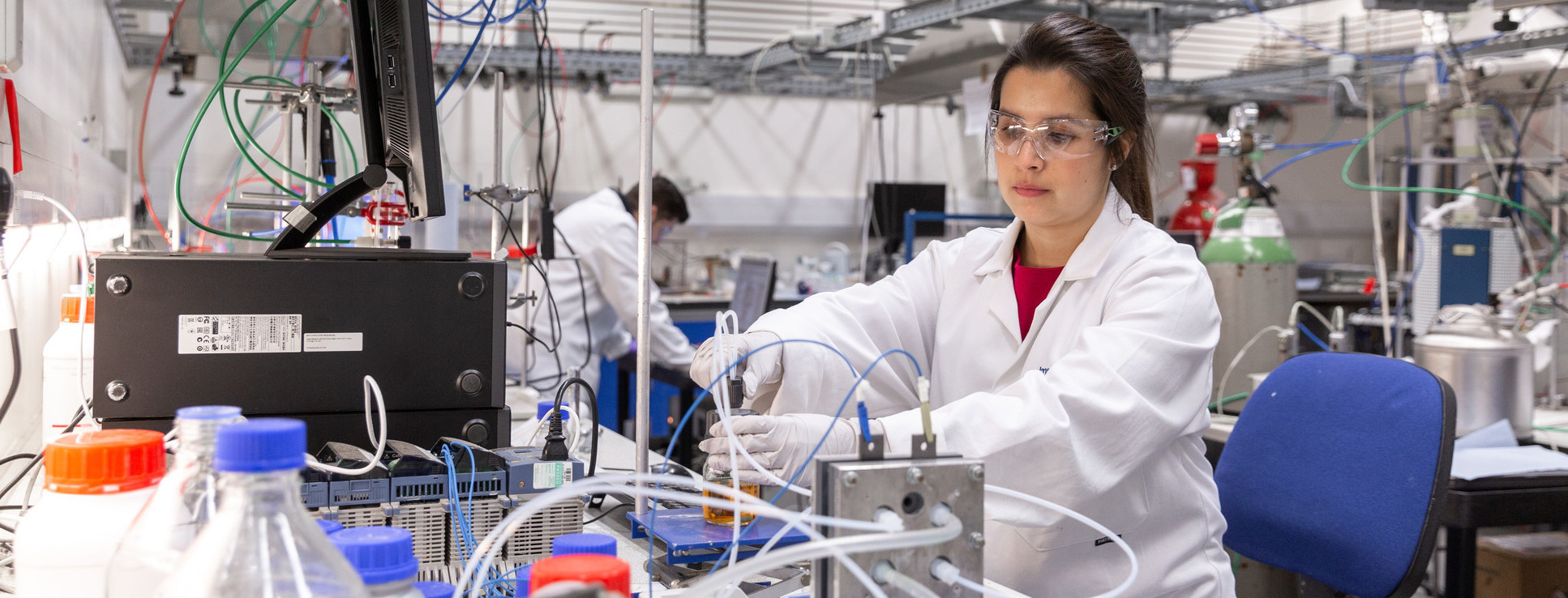 A PhD student in a laboratory