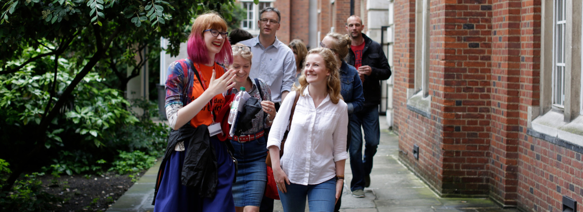 A student leading a campus tour