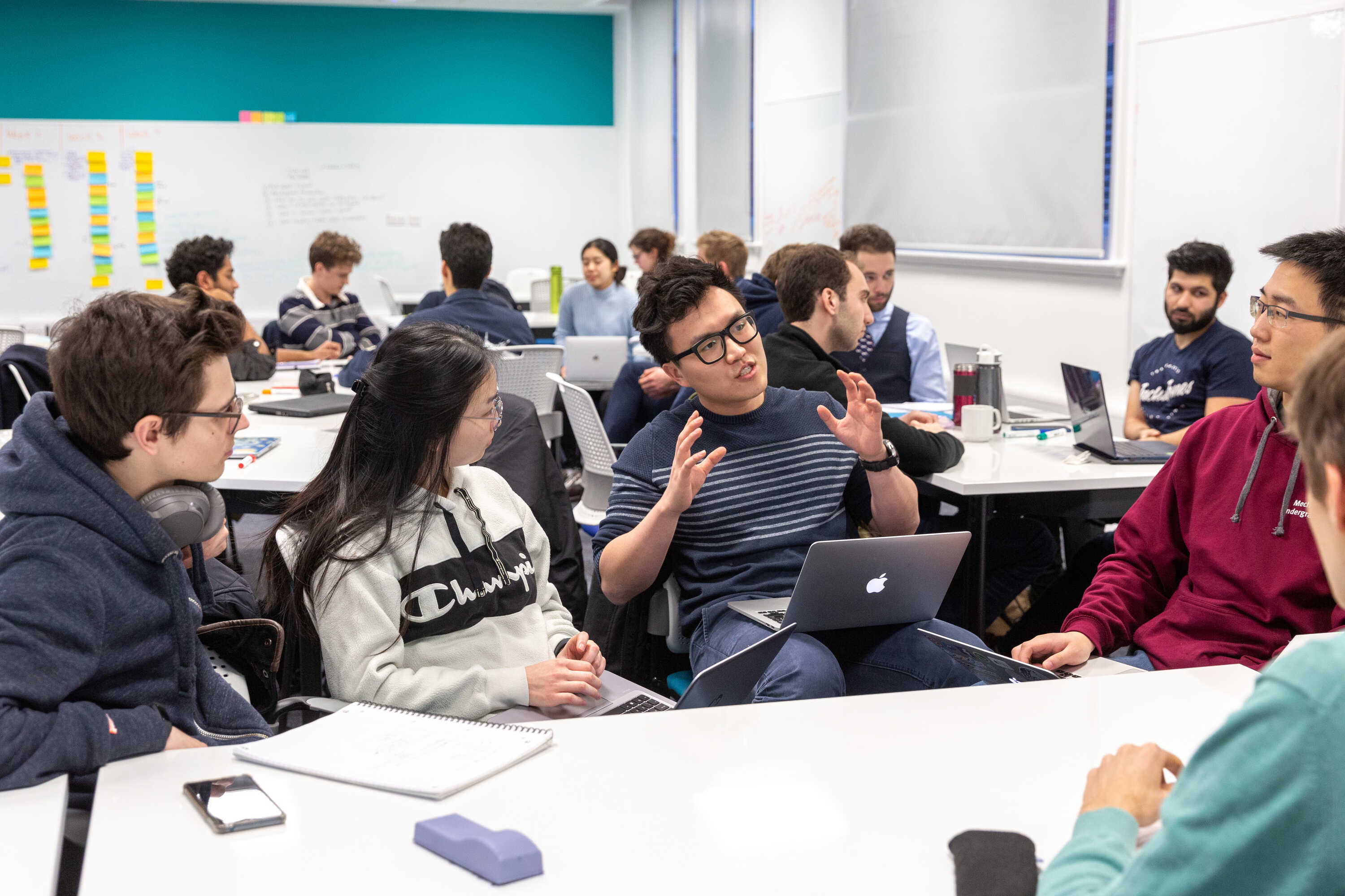 Students in classroom having group discussions