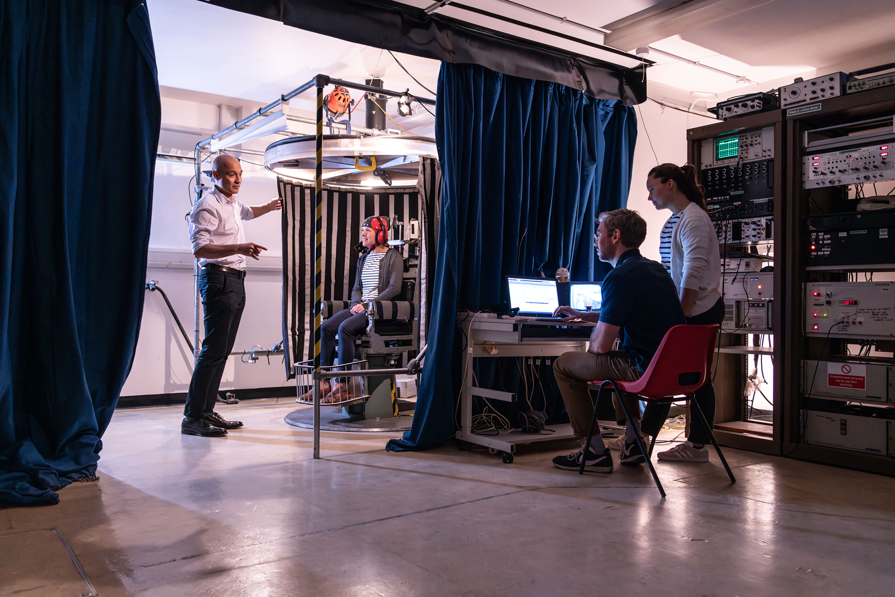 Students and a researcher during a test EEG Scan