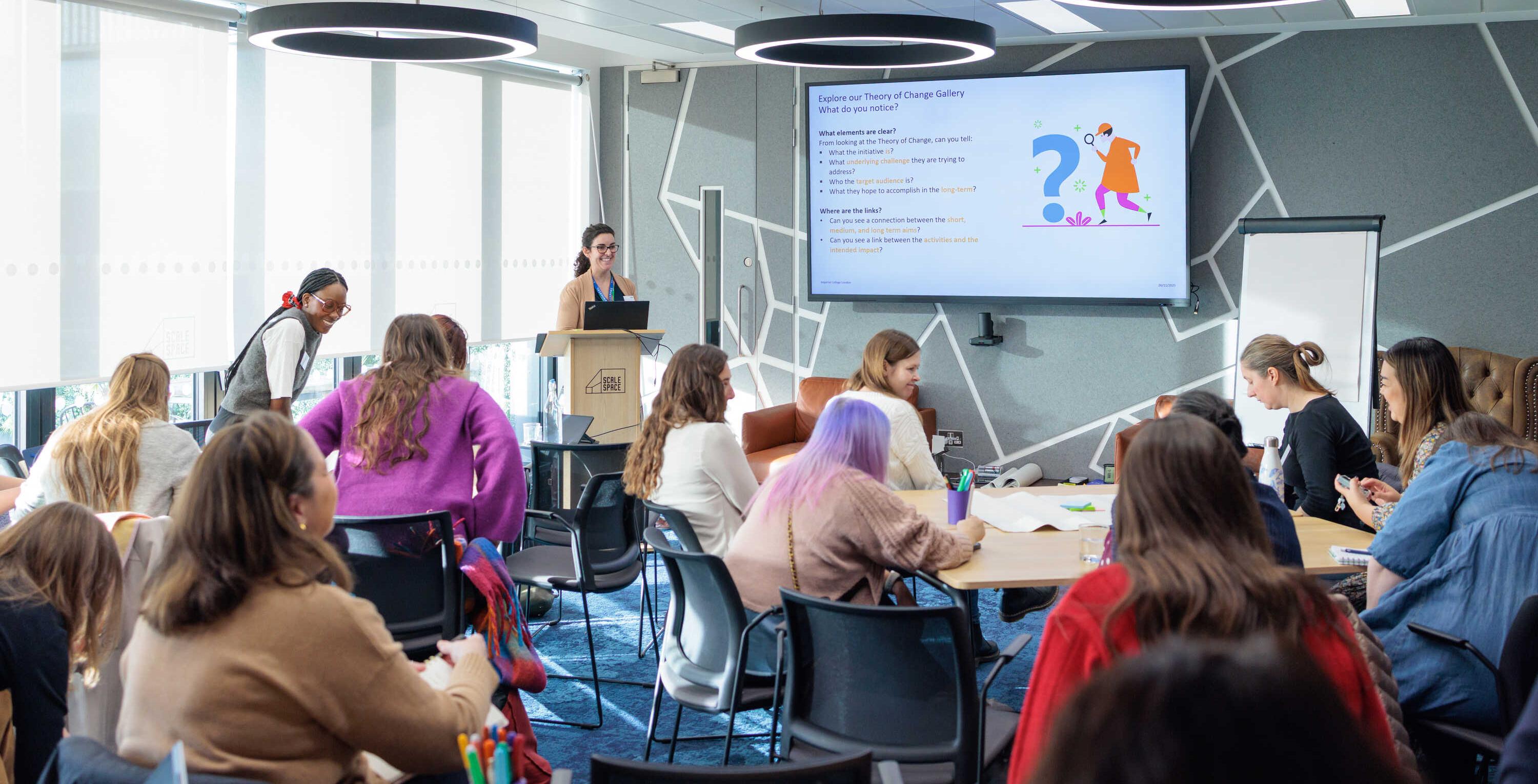 Alexandra Lyons presenting on how to plan your impact story in one of the afternoon Deep Dive sessions.